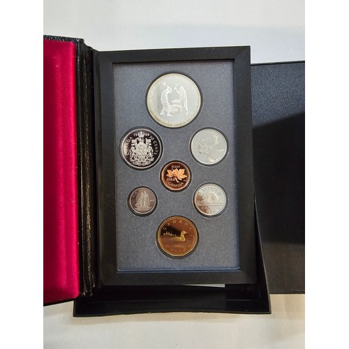 146 - Canada - 1986 and 1988 Proof Sets each comprising of 7 coins and having a Silver Dollar eachLocation... 