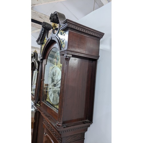 89A - A George III mahogany 8 day longcase clock, the case having a broken swan neck pediment with painted... 