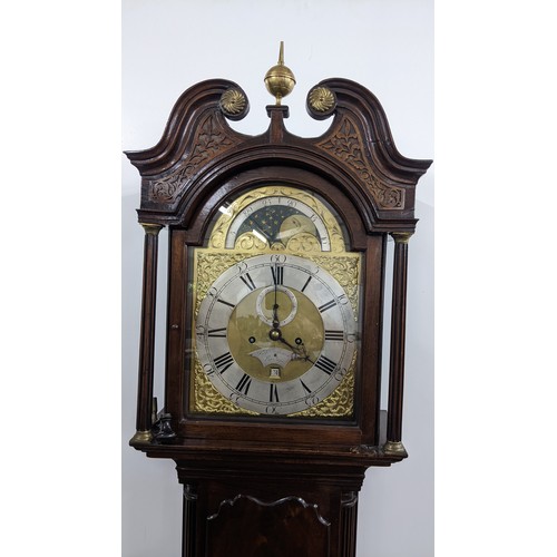 89 - A George III Mahogany 8 day longcase clock, the case having a broken swan neck pediment with pierced... 