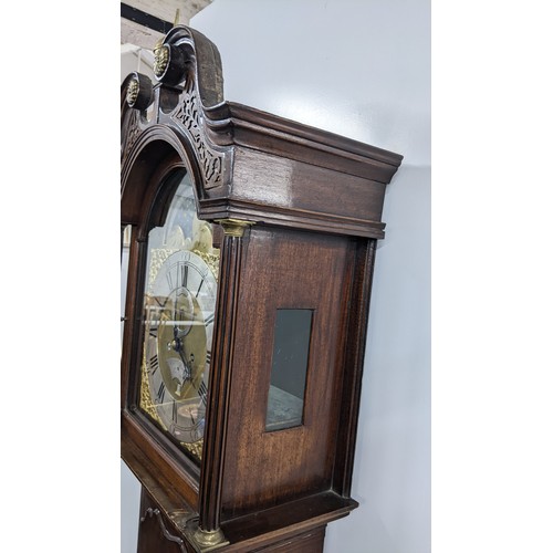 89 - A George III Mahogany 8 day longcase clock, the case having a broken swan neck pediment with pierced... 