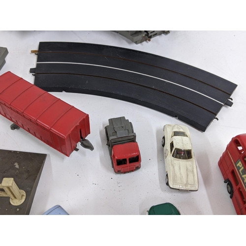 125 - Triang Minic Motorway (unboxed) to include a blue coach, a Jaguar E-Type, a Chevrolet Corvette, a Ro... 