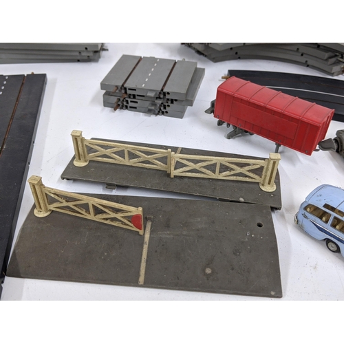 125 - Triang Minic Motorway (unboxed) to include a blue coach, a Jaguar E-Type, a Chevrolet Corvette, a Ro... 