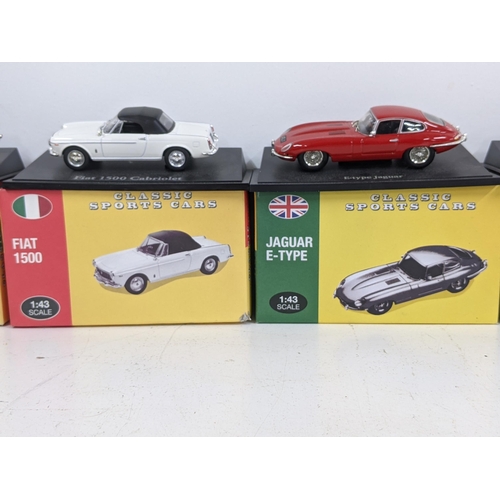 127 - Five Atlas Edition boxed cars to include an Aston Martin DB5, a BMW 507, a Jaguar E-Type and an Aust... 