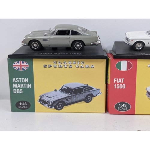 127 - Five Atlas Edition boxed cars to include an Aston Martin DB5, a BMW 507, a Jaguar E-Type and an Aust... 