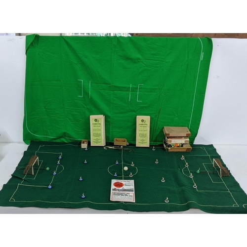 130 - A collection of Subbuteo including teams, pitches, and a range of original instructions and brochure... 