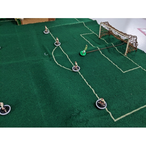 130 - A collection of Subbuteo including teams, pitches, and a range of original instructions and brochure... 