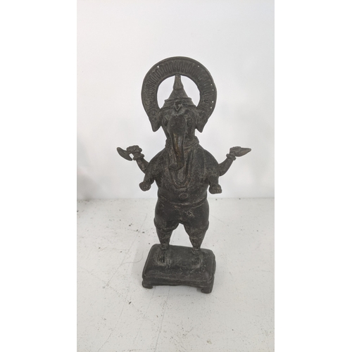 403 - 20th century and later mainly Indian items to include a patinated cast metal statue of Ganesh and ot... 