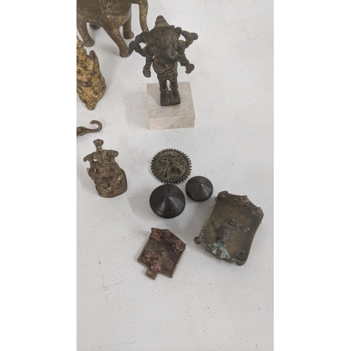 403 - 20th century and later mainly Indian items to include a patinated cast metal statue of Ganesh and ot... 