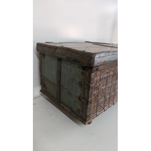 408 - An 18th century Indian chest on raised feet, 37.5cm h x 54cm w x 398cm d
Location: RWF
If there is n... 