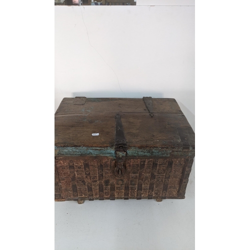 408 - An 18th century Indian chest on raised feet, 37.5cm h x 54cm w x 398cm d
Location: RWF
If there is n... 