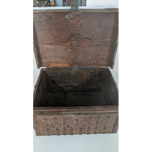 408 - An 18th century Indian chest on raised feet, 37.5cm h x 54cm w x 398cm d
Location: RWF
If there is n... 