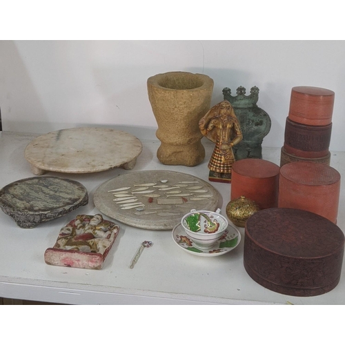 427 - A mixed lot to include Chinese mother of pearl and bone game counters together with Chapati stones, ... 