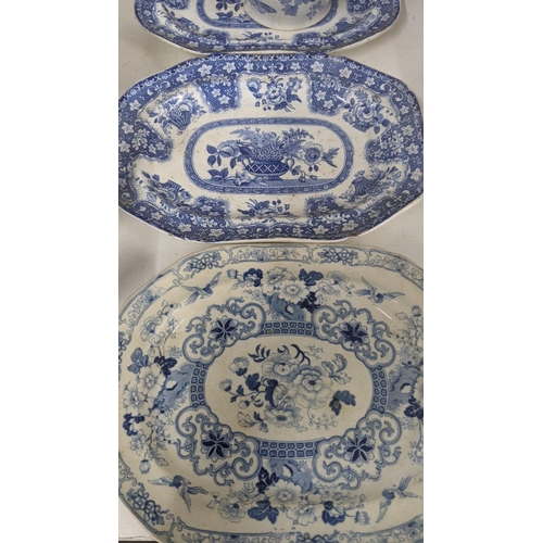 434 - Mainly 19th century blue and white ceramics to include a gravy boat, platters, masonic candlestick h... 