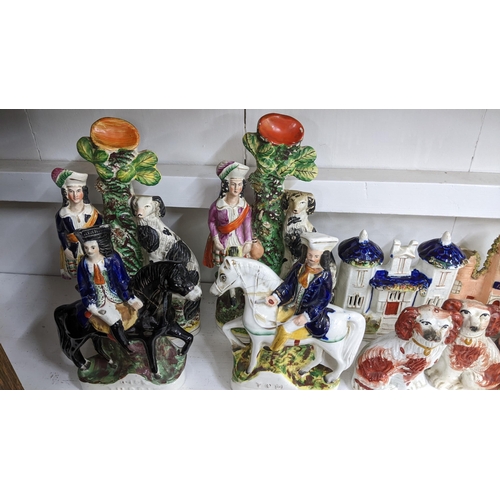 450 - A collection of 19th century Staffordshire and later Staffordshire style ornaments to include pastel... 