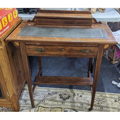 456 - An Edwardian rosewood ladies writing desk having a raised back with fitted interior, leather scriber... 