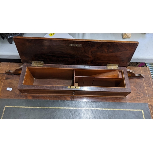 456 - An Edwardian rosewood ladies writing desk having a raised back with fitted interior, leather scriber... 