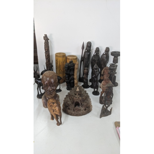 461 - Treen items to include mainly African tribal examples including a bust of an elderly gentleman and o... 