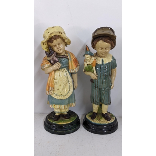 468 - A pair of 19th century Majolica figurines of a boy and girl
Location: 1-1
If there is no condition r... 