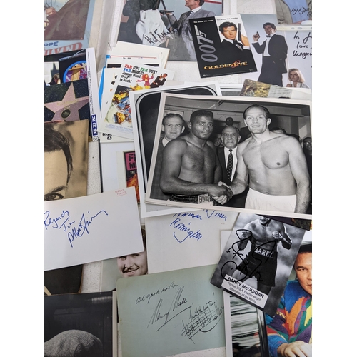 442 - Sporting and film autographed memorabilia to include Boxing, and James Bond to include signed photos... 