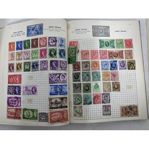 443 - Three stamp albums containing stamps from around the world to include British stamps, various Penny ... 