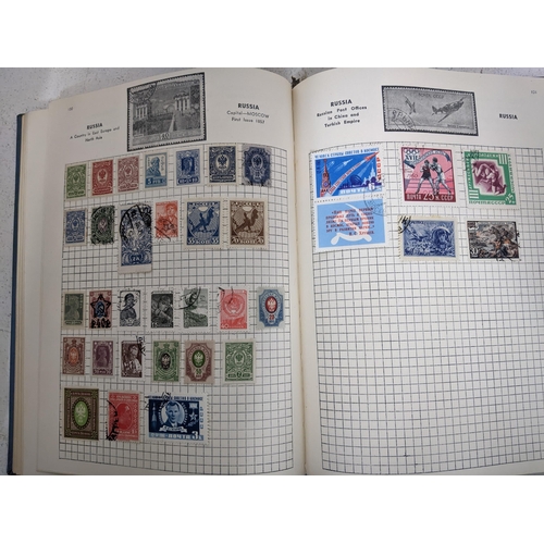 443 - Three stamp albums containing stamps from around the world to include British stamps, various Penny ... 