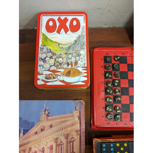 463 - A mixed lot to include watches, travelling chess sets, a 1960s London Palladium programme and other ... 