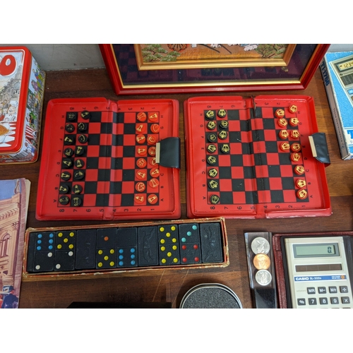 463 - A mixed lot to include watches, travelling chess sets, a 1960s London Palladium programme and other ... 