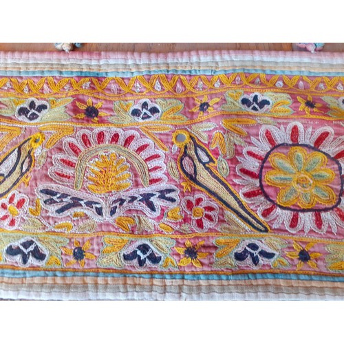 91 - A group of 5 mid 20th Century Indian hand-sewn window valances and Toran door hangings in various si... 