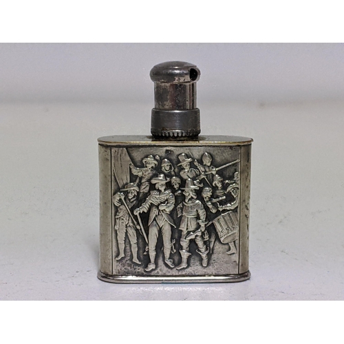 184 - A Continental silver and silver plated perfume atomiser, embossed with a Dutch Army to the front and... 