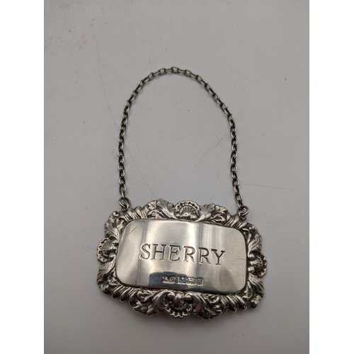 216 - A silver decanter label 'Sherry', Birmingham 1959. Location: CAB 5

Location:
If there is no conditi... 