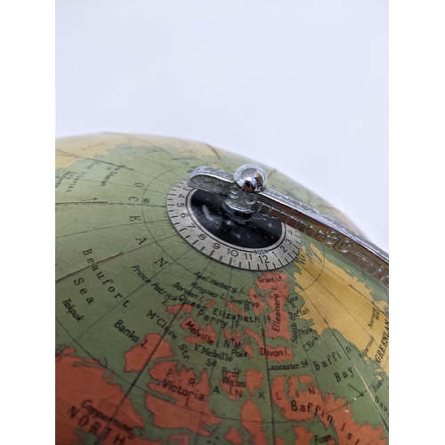 76 - A mid 20th century Philips' Challenge Globe, on a wooden stand, 46cm high. Location: 2-2. 

Location... 