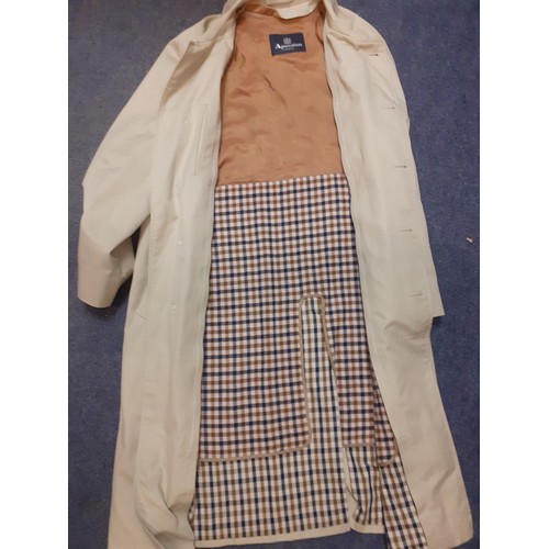 24 - Aquascutum- A gents beige waterproof trench coat approx 44