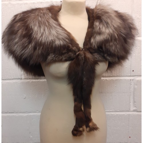 72 - A vintage silver fox fur 'cape-style' stole. Location:BWR
Condition:Good, no stiffness, loss of fur ... 