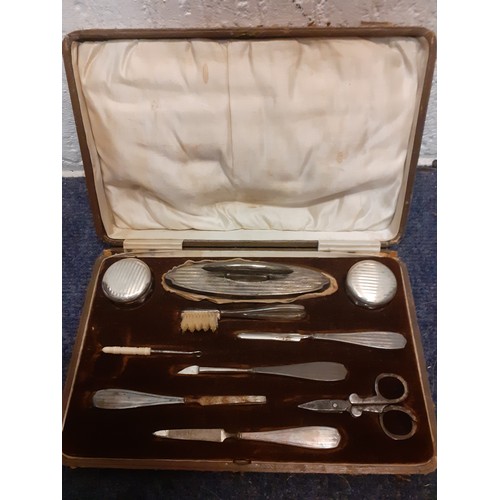 80 - An early 20th Century incomplete cased silver manicure/vanity set, makers mark K&A (Horton & Allday)... 