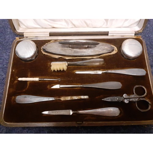 80 - An early 20th Century incomplete cased silver manicure/vanity set, makers mark K&A (Horton & Allday)... 