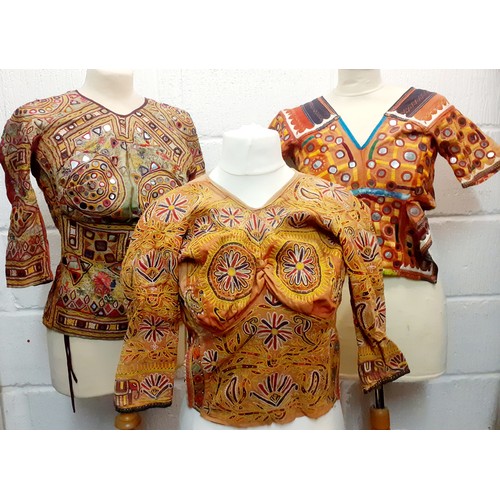 78 - Three traditional and elaborately embroidered Indian Dandiya female dance blouses, two with mirrored... 