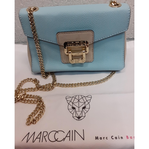 23 - Marccain- An unused pale blue and grey leather occasional shoulder bag having gold tone hardware and... 