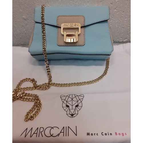 23 - Marccain- An unused pale blue and grey leather occasional shoulder bag having gold tone hardware and... 