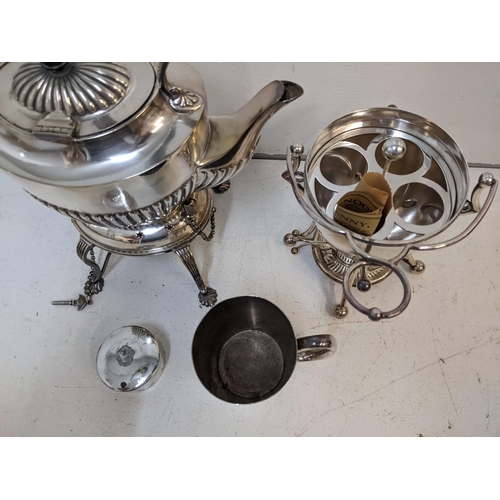 122 - Silver plate to include an early 20th century spirit kettle, an egg coddler, half pint tankard, and ... 