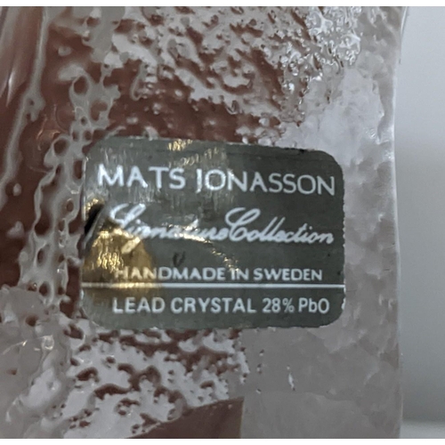 92 - A Mats Jonasson Signature Collection Swedish glass paperweight, decorated with two ducklings, signed... 