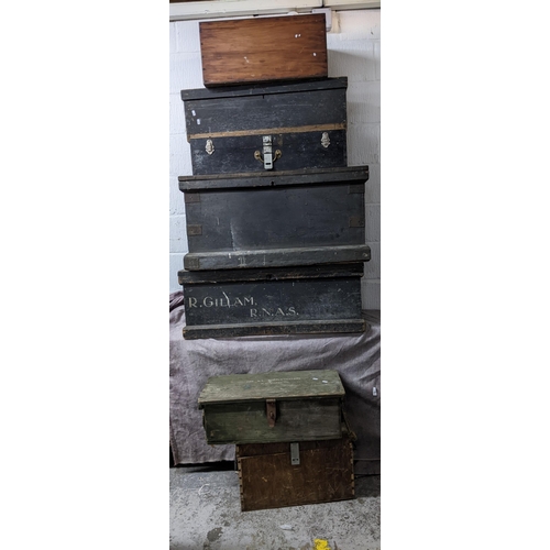 45 - Six early 20th century and later wooden chests, the two larger are painted pine with folding metal h... 