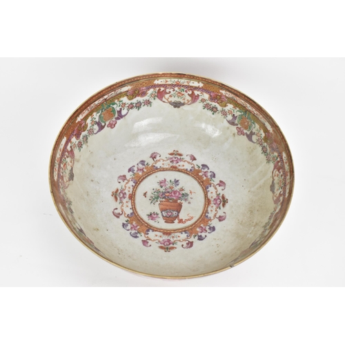 1 - A Chinese export Famille Rose punch bowl, Qianlong, painted in the Mandarin palette with panels depi... 