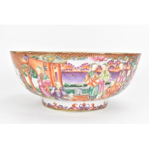 1 - A Chinese export Famille Rose punch bowl, Qianlong, painted in the Mandarin palette with panels depi... 