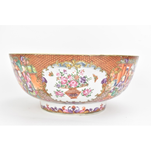 1 - A Chinese export Famille Rose punch bowl, Qianlong, painted in the Mandarin palette with panels depi... 