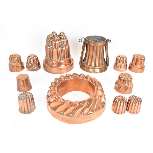 106 - A selection of 19th century copper moulds to include one of circular gadrooned form, another of cast... 