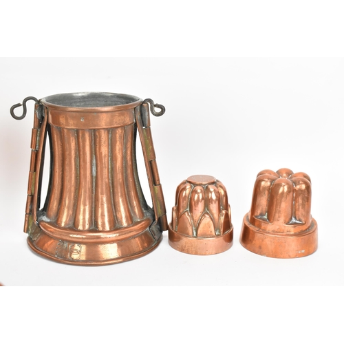 106 - A selection of 19th century copper moulds to include one of circular gadrooned form, another of cast... 