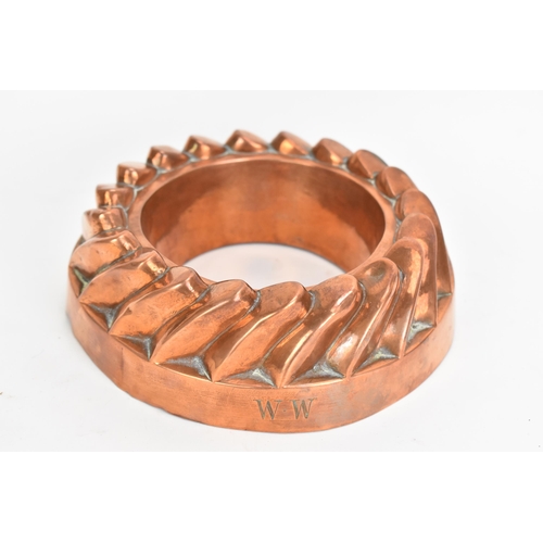 106 - A selection of 19th century copper moulds to include one of circular gadrooned form, another of cast... 