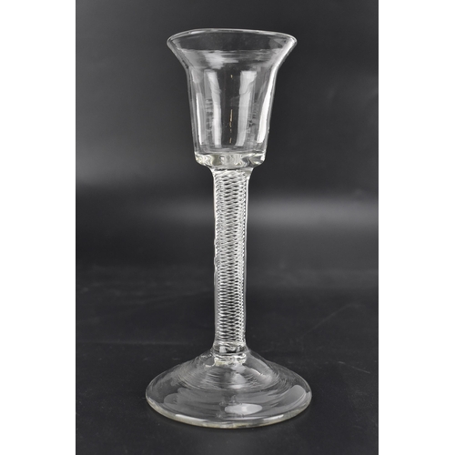 108 - Three mid 18th century drinking glasses, each with an air twist stem, to include one with a bell sha... 