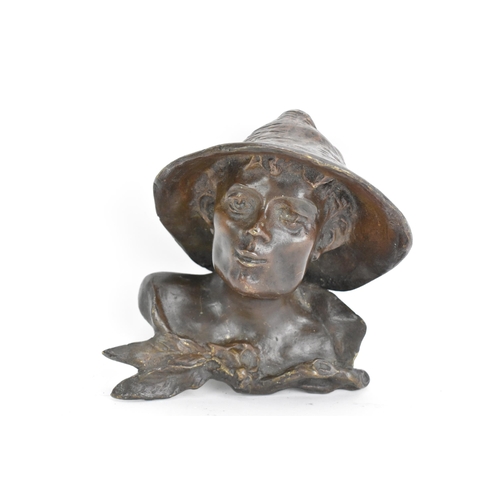 111 - An early 20th century bronze head sculpture, depicting a boy wearing a hat, 11.5cm high x 13cm wide
... 