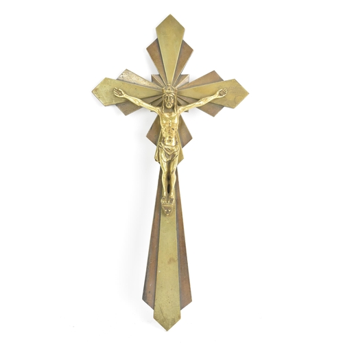 112 - An Art Deco gilt metal crucifix, cast with Christ, signed to the reverse 'E Hoffer' and numbered 5.4... 